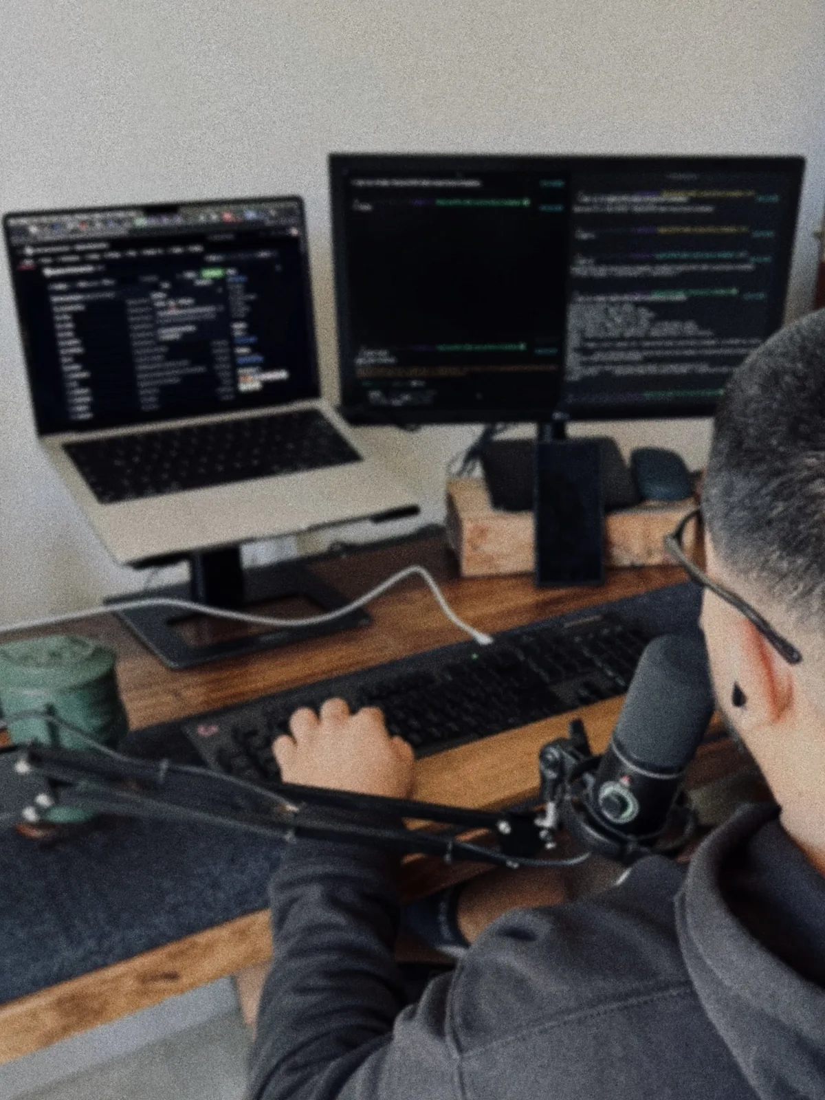 A Genobyte developer coding at his desk
